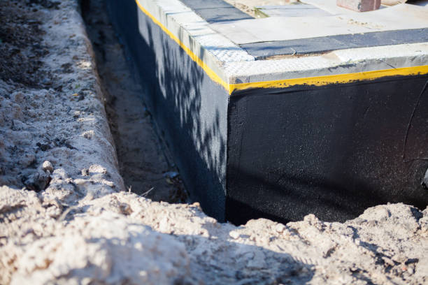 Professional Waterproofing technician working in Brookfield, WI